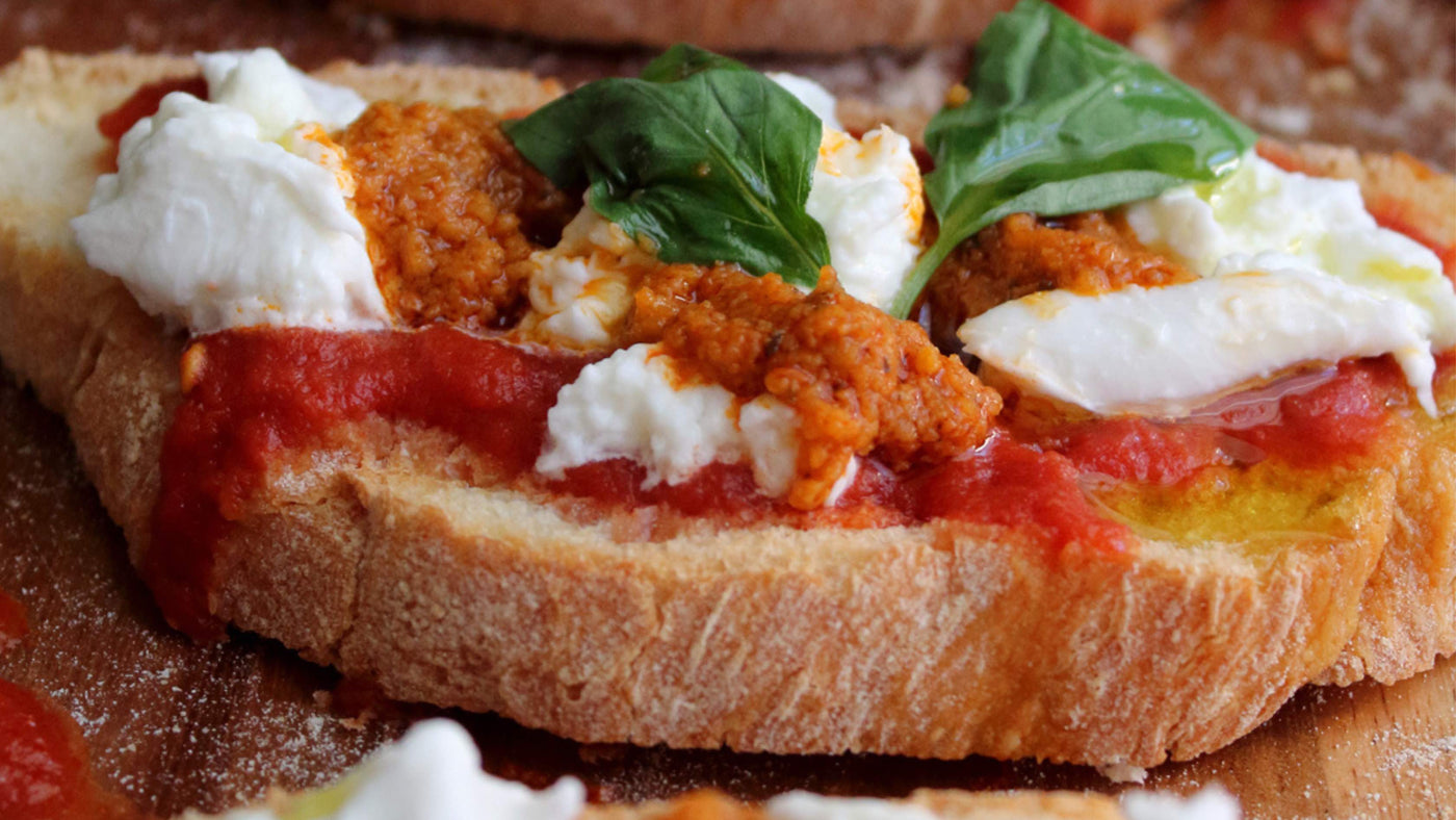 Bruschetta with Bell Pepper Sauce, Mozzarella, and Infused Lemon Olive Oil