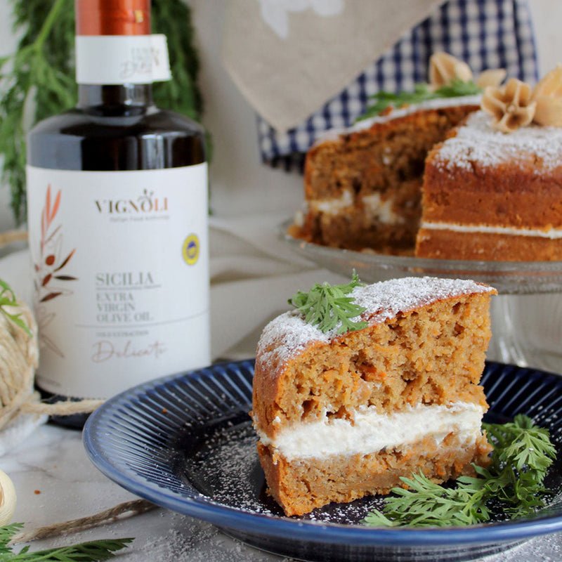 Vignoli Extra Virgin Olive Oil IGP Sicilia - Delicate front of 16.9oz bottle with carrot cake