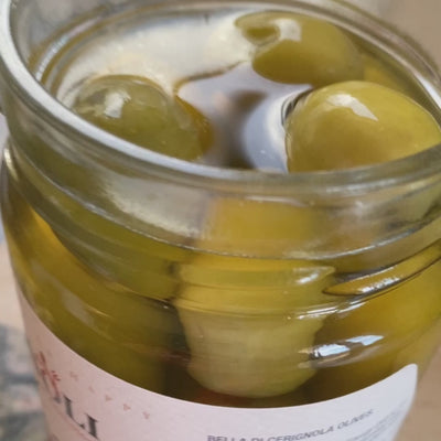Bella di Cerignola Olives open jar and cutting olive