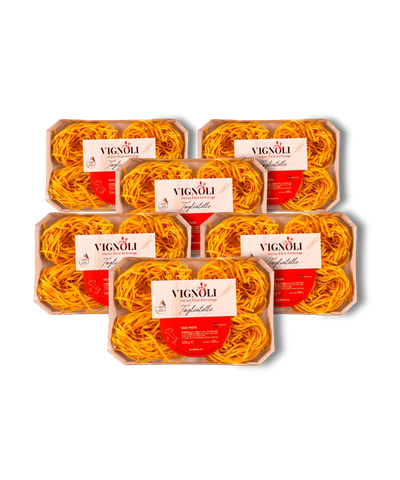 Vignoli Italian Tagliatelle Egg Pasta front of 8.8oz pack of 6